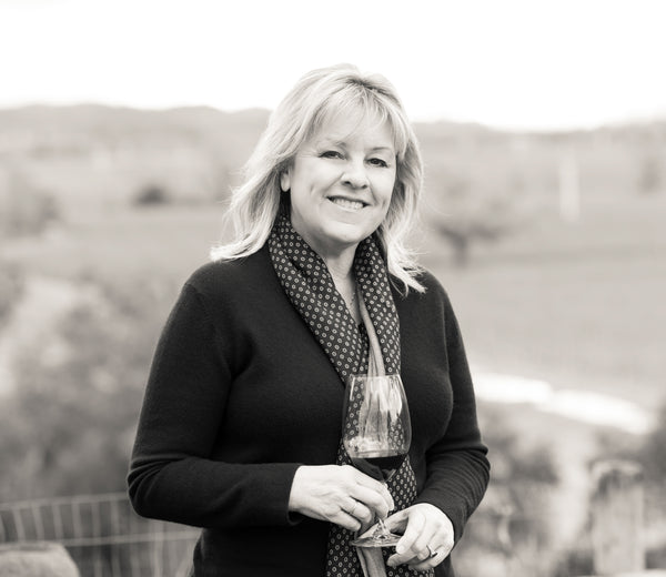 Image of Carol Schrader in wine country